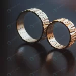 wedding rings captured with reflection surface crc2032b296 size2.76mb 3800x2533 1 - title:Home - اورچین فایل - format: - sku: - keywords:وکتور,موکاپ,افکت متنی,پروژه افترافکت p_id:63922