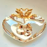 wedding rings lie beautiful golden plate decorate crcaf2b5d0c size10.58mb 5486x3742 1 - title:Home - اورچین فایل - format: - sku: - keywords:وکتور,موکاپ,افکت متنی,پروژه افترافکت p_id:63922