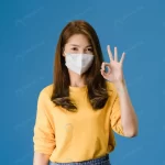 young asia girl wearing medical face mask gesturi crc590dff5f size13.56mb 6000x4000 1 - title:Home - اورچین فایل - format: - sku: - keywords:وکتور,موکاپ,افکت متنی,پروژه افترافکت p_id:63922