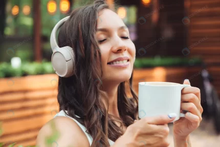 young beautiful woman with headphones is sitting t rnd539 frp31936152 - title:graphic home - اورچین فایل - format: - sku: - keywords: p_id:353984
