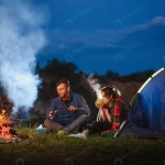 young couple having rest bonfire beside camp blue rnd346 frp9150168 - title:Home - اورچین فایل - format: - sku: - keywords:وکتور,موکاپ,افکت متنی,پروژه افترافکت p_id:63922