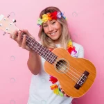 - young hawaiian woman playing ukulele isolated pink rnd913 frp16389482 1 - Home