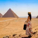 young woman visiting pyramids egypt crc75697dc0 size33.74mb 6016x4000 - title:Home - اورچین فایل - format: - sku: - keywords:وکتور,موکاپ,افکت متنی,پروژه افترافکت p_id:63922