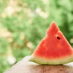 one piece ripe red watermelon old rustic table ou crc015d0f83 size7.08mb 4608x3072 - title:Home - اورچین فایل - format: - sku: - keywords:وکتور,موکاپ,افکت متنی,پروژه افترافکت p_id:63922
